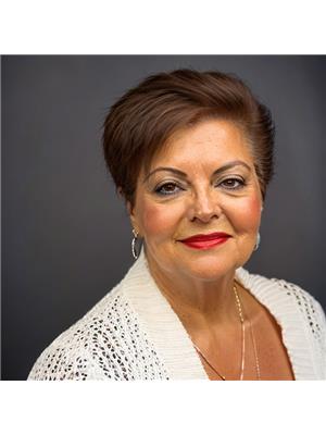 SHARON J.